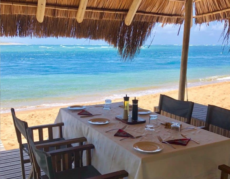 Mozambique: Lunch under thatch, the Indian Ocean beside it.